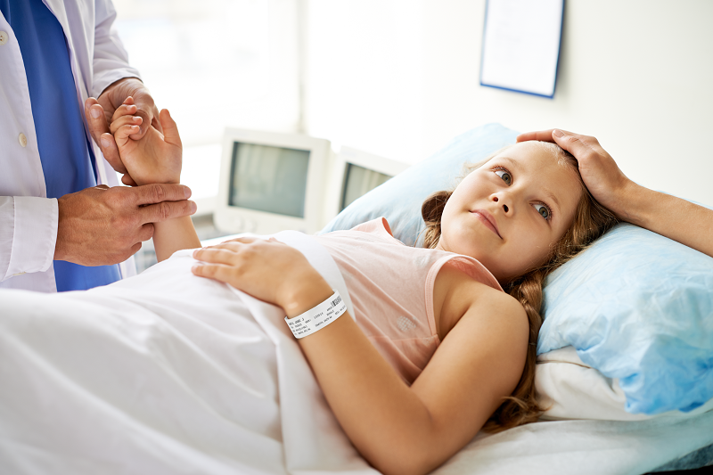 Doctor caring for a young patient 